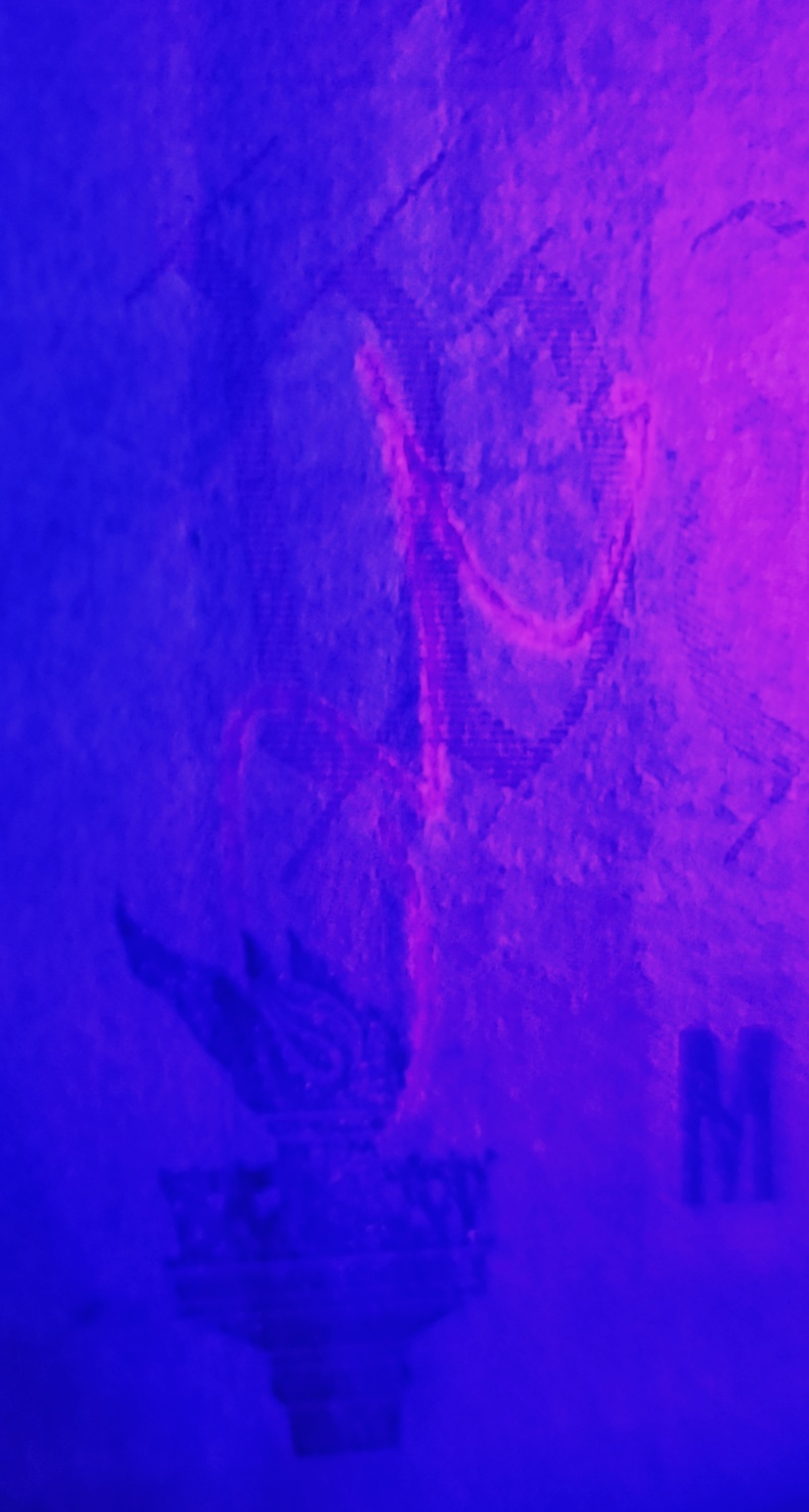 2013-Ten-Dollar-Bill-With-A-Random-Purple-Ink-Spot
